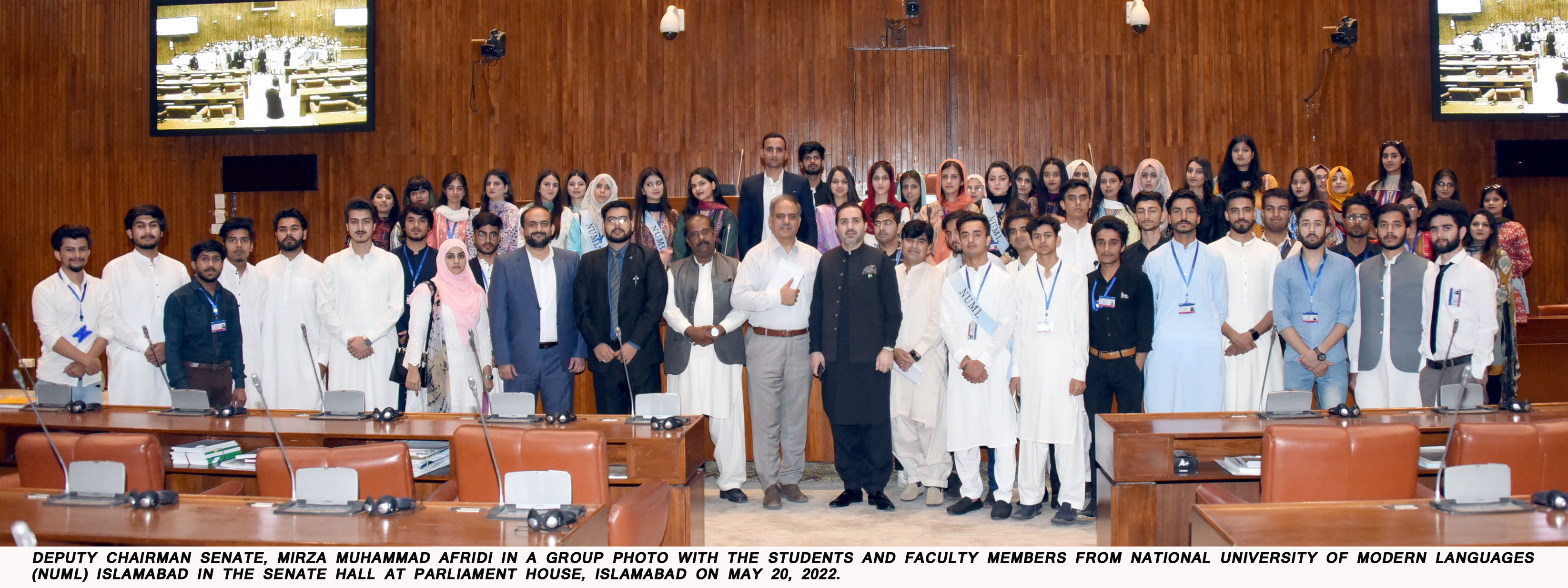 Deputy Chairman Senate, Mirza Muhammad Afridi in a group photo with students and faculty members of National University of Modern Languages (NUML) Islamabad in Senate Hall, Parliament House on 20 May 2022.