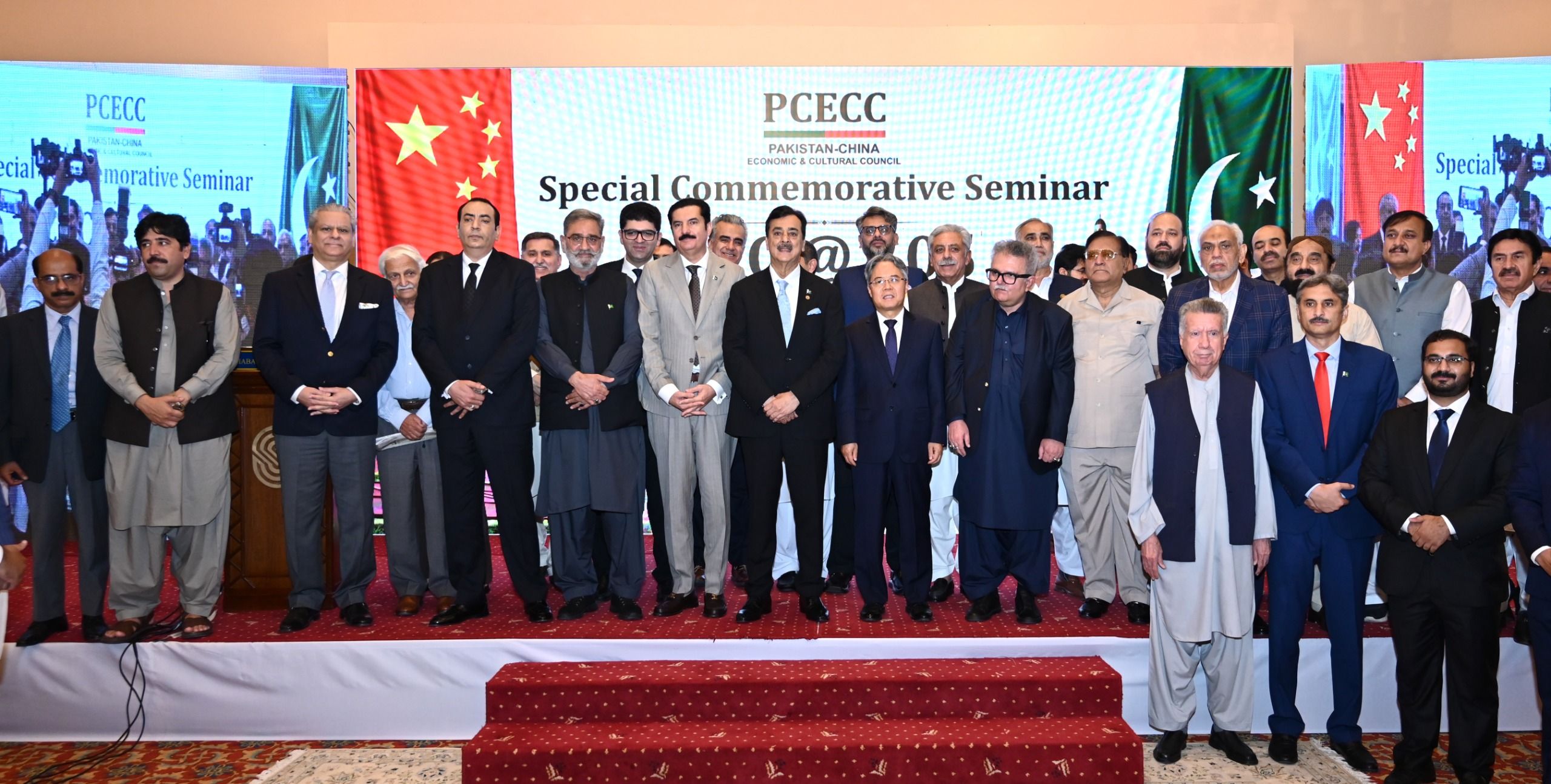 Acting President Syed Yousuf Raza Gilani in a group photograph with Ambassador of the People’s Republic of China to Pakistan Jiang Zaidong, Governor Khyber Pakhtunkhwa Faisal Karim Kundi, and other distinguished guests at the Pakistan-China Economic and Cultural Council event marking the 105th anniversary of the founding of the Communist Party of China.