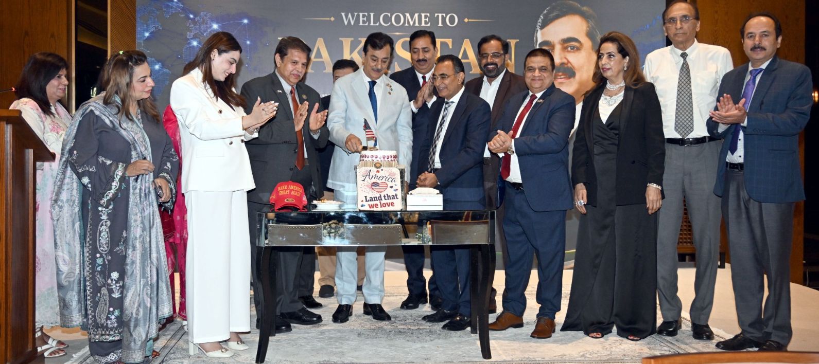 Chairman Senate, Syed Yousaf Raza Gilani cutting a cake at a reception held in honour of representatives of the New York Chamber of Small Business Corp., USA, and prominent Pakistani businessmen in Islamabad