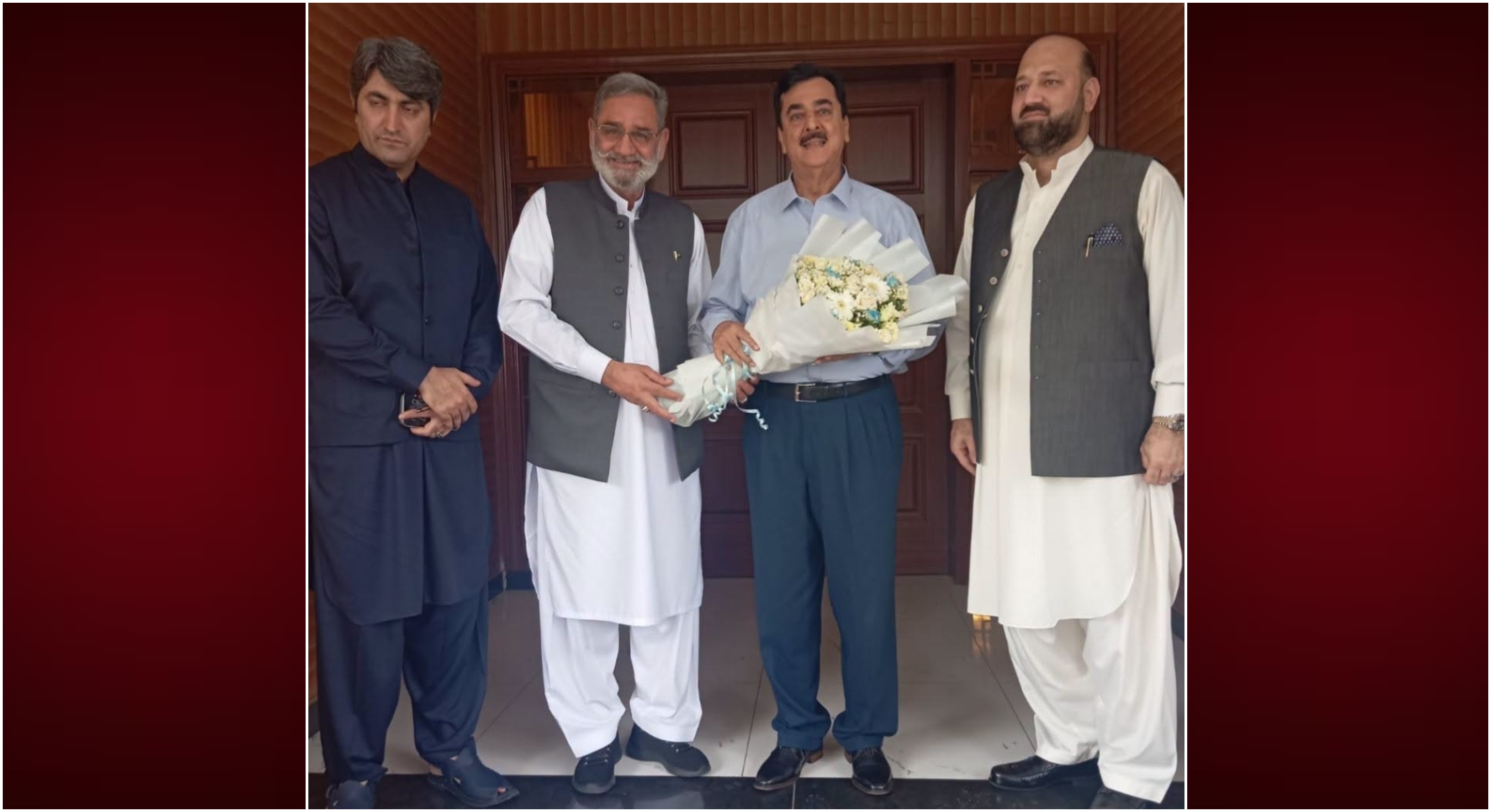 Speaker, Khyber Pakhtunkhwa Assembly Mr. Babar Saleem Swati, presenting bouquet to Chairman Senate, Syed Yousaf Raza Gilani at his residence in Ministers Enclave, Islamabad